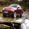 Waterfall & Red Car